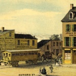 A colored drawing of Howard Street in Baltimore in the 19th c., showing a street car, brick buildings, and businesses. 