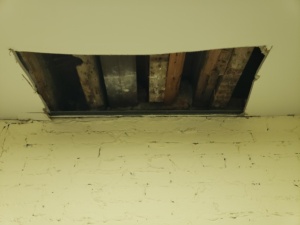 A hole cut in the ceiling in one of the rooms at the Peale. 