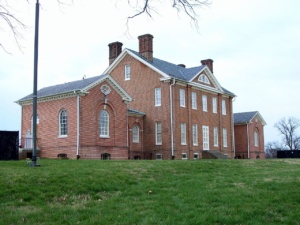 The facade of the colonial brick house, called Mount Clare.