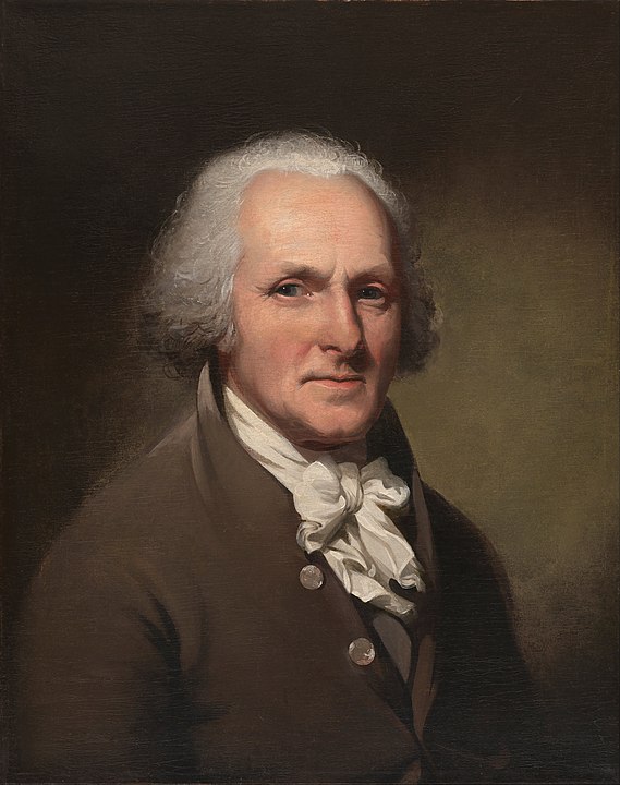 A portrait of Charles Willson Peale wearing a brown jacket and with a white wig or powdered hair.